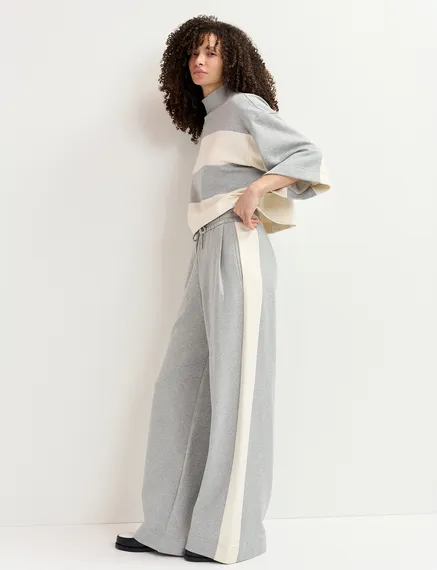 Grey wide-leg track pants with off-white stripes