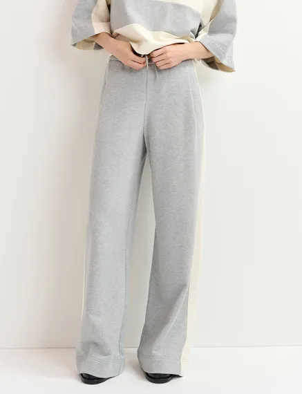 Grey wide-leg track pants with off-white stripes