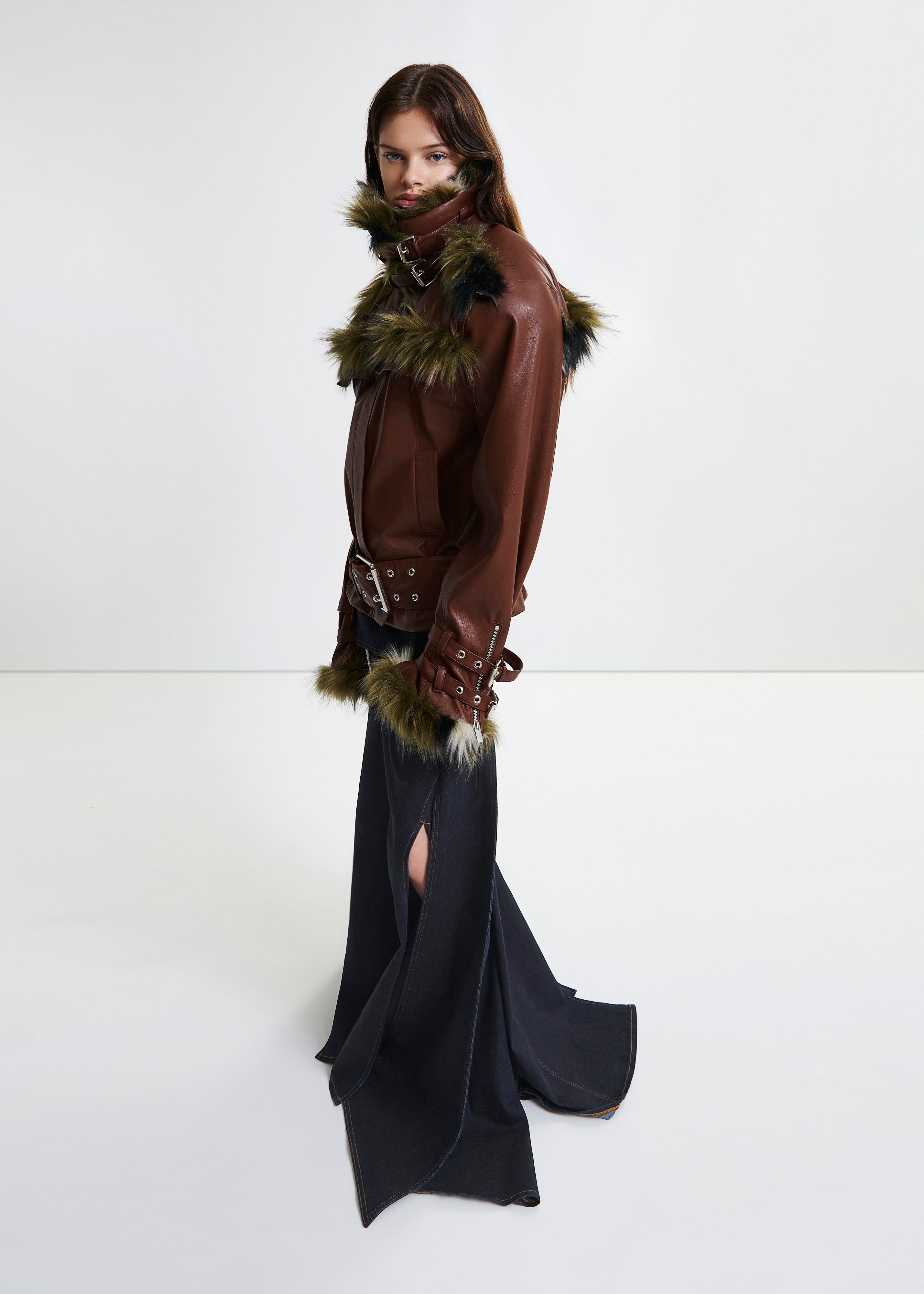 Brown oversized faux leather jacket with faux fur lining and