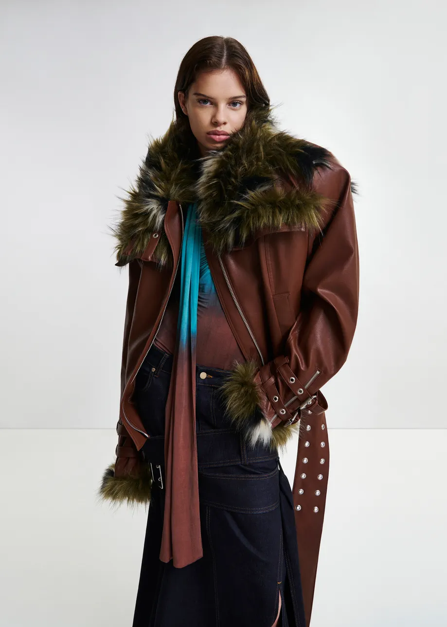 Brown oversized faux leather jacket with faux fur lining and buckle fastenings