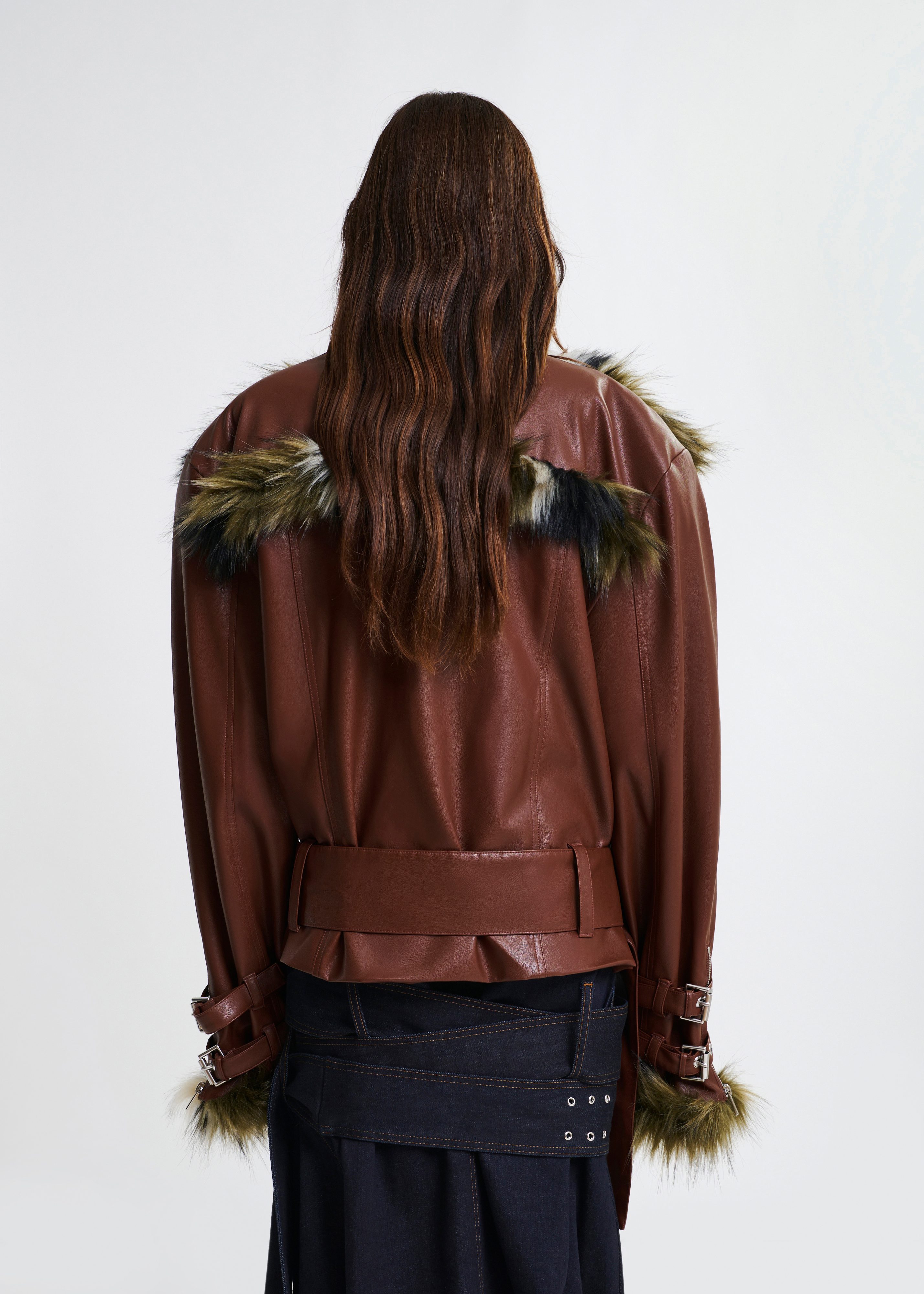 Brown oversized faux leather jacket with faux fur lining and