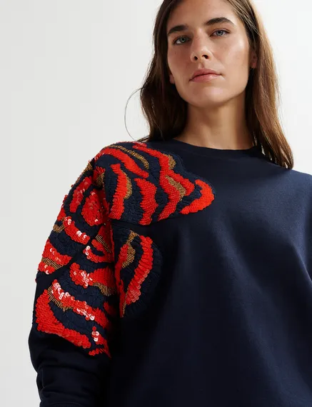 Marineblauwe biokatoenen sweater met pailletten en kralen