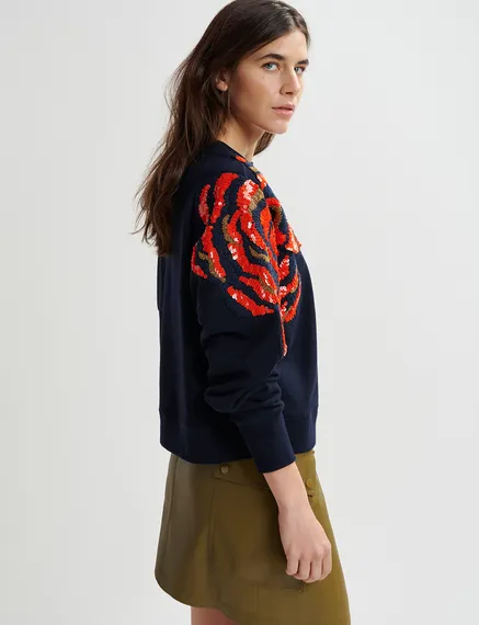 Marineblauwe biokatoenen sweater met pailletten en kralen