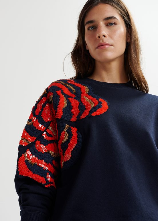 Marineblauwe biokatoenen sweater met pailletten en kralen