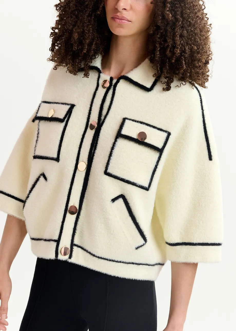 Cardigan blanc cassé en tricot pelucheux