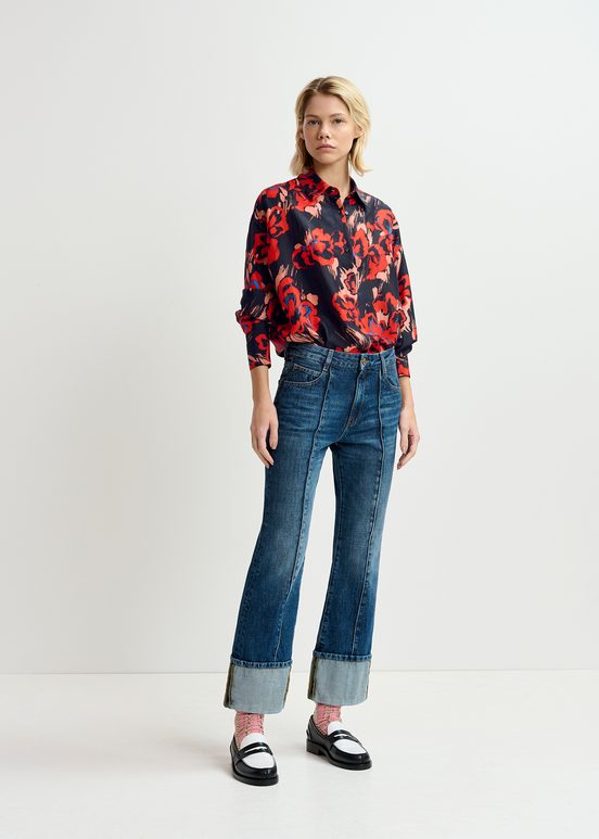 Kick flare blue jeans with turn-up hem