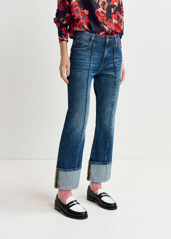 Kick flare blue jeans with turn-up hem