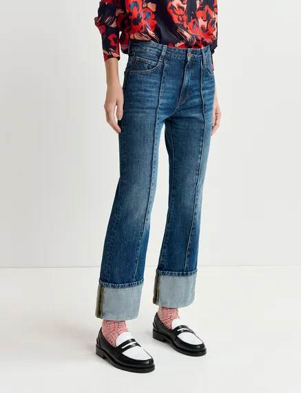 Kick flare blue jeans with turn-up hem