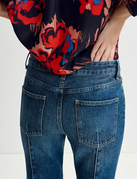 Kick flare blue jeans with turn-up hem