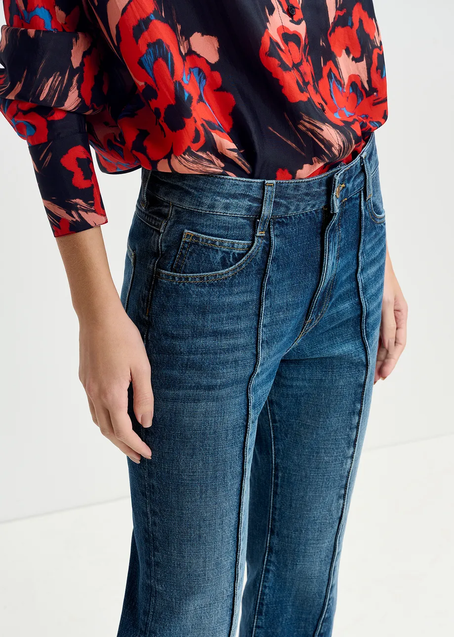 Kick flare blue jeans with turn-up hem