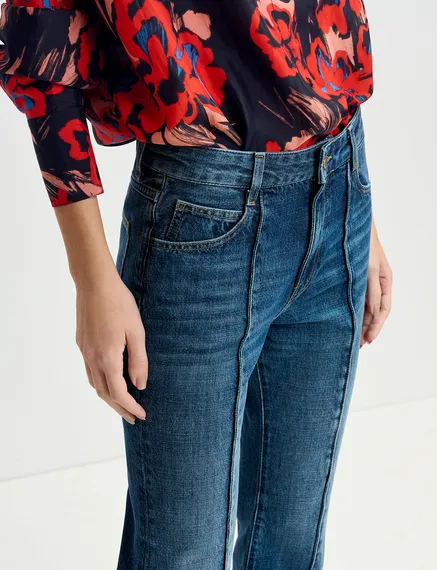 Kick flare blue jeans with turn-up hem