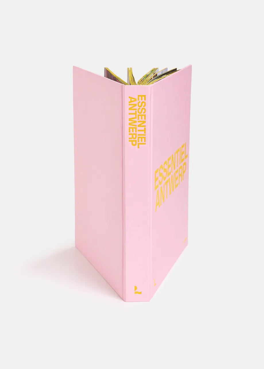 Pink and yellow 25 years coffee table book with exclusive paperweight