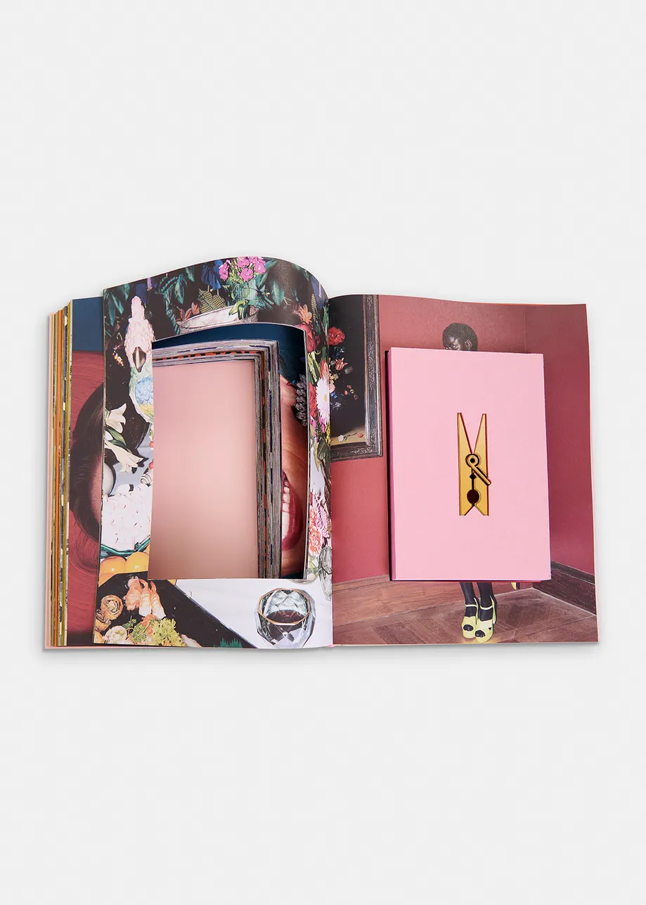 Pink and yellow 25 years coffee table book with exclusive paperweight