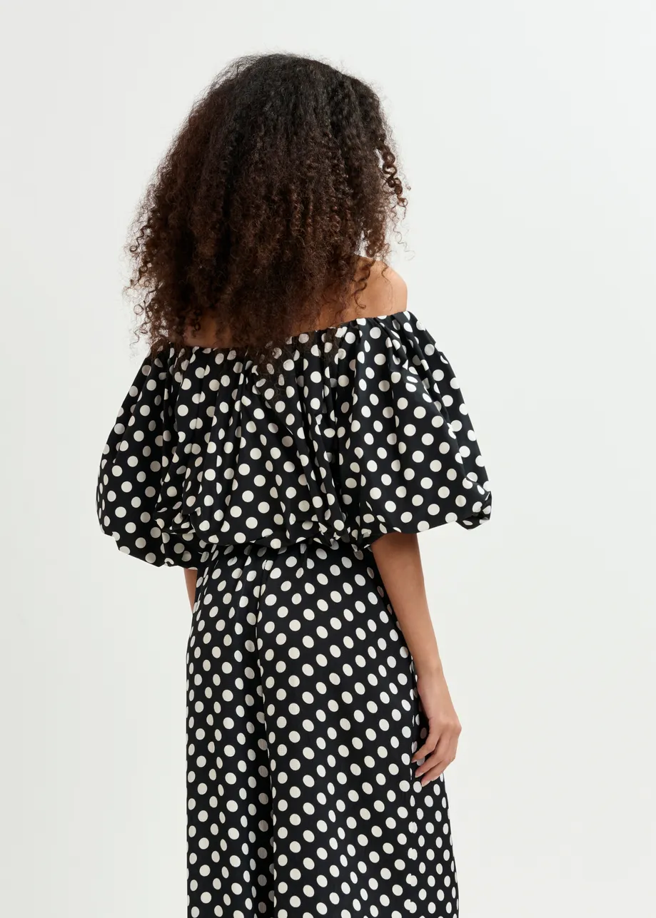 Black and white polka-dot gathered bodysuit with puffed sleeves