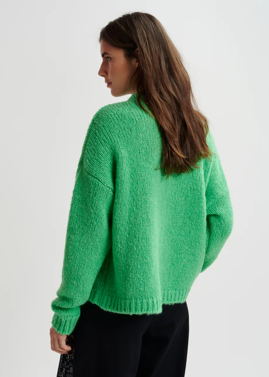 Maglione lavorato a intarsio verde