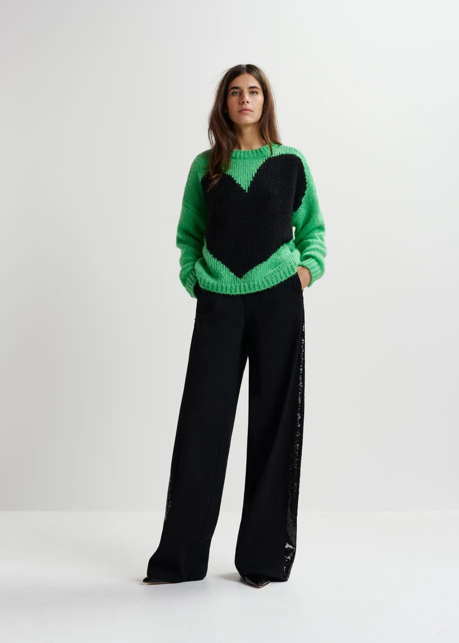 Pull vert avec cœur en intarsia