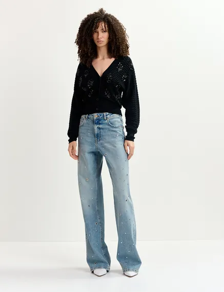 Blue eyelet-embellished jeans