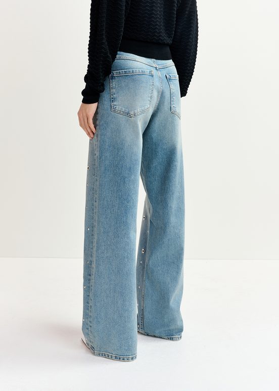 Blue eyelet-embellished jeans