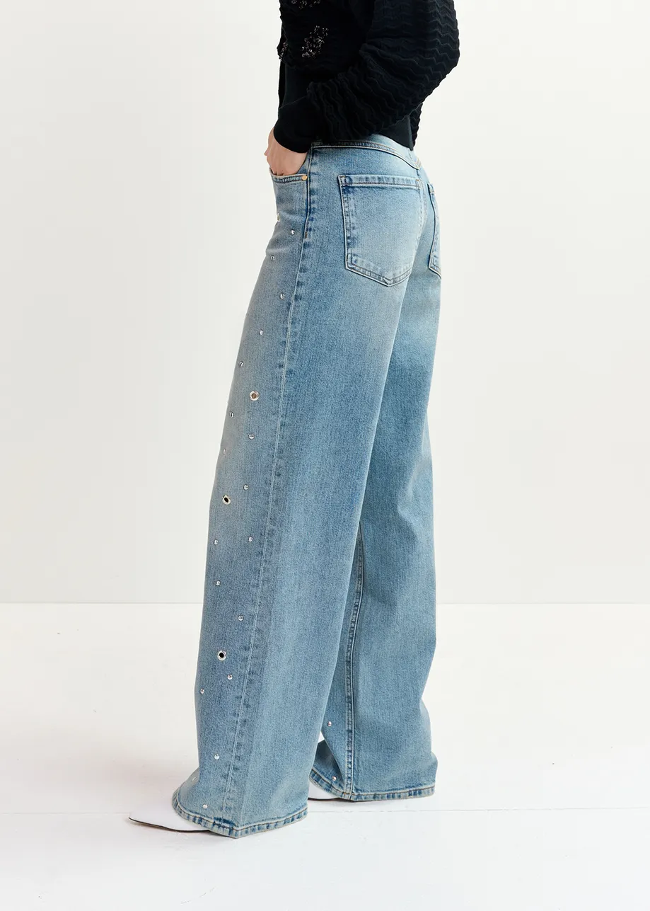 Blue eyelet-embellished jeans