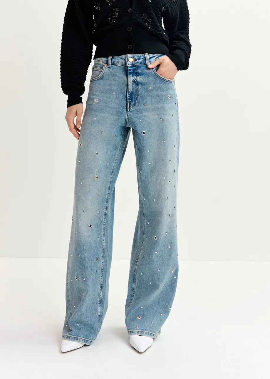 Blue eyelet-embellished jeans