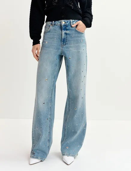 Blue eyelet-embellished jeans