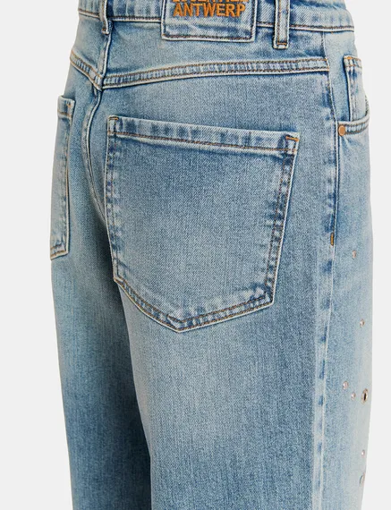 Blue eyelet-embellished jeans