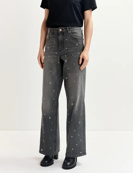 Grey eyelet-embellished jeans