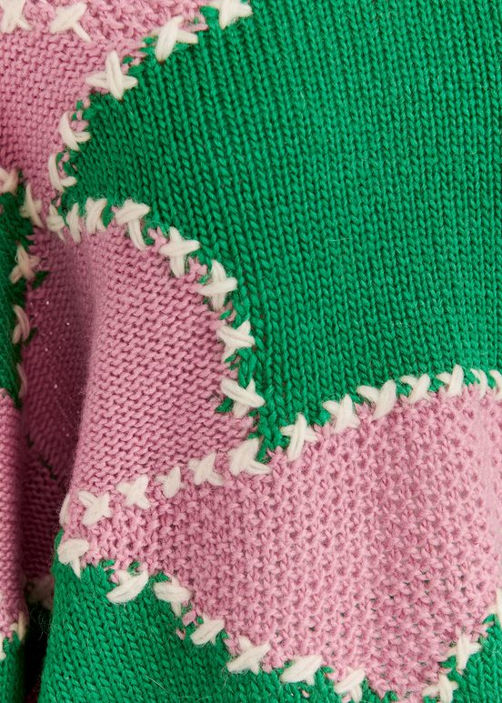 Pull en maille patchwork vert et rose clair