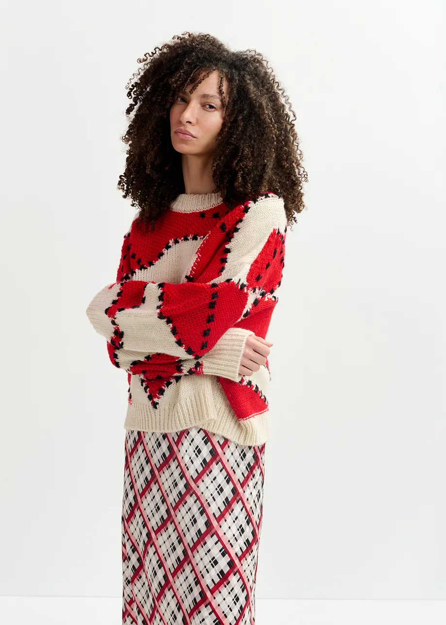 Ecru and red patchwork knit sweater