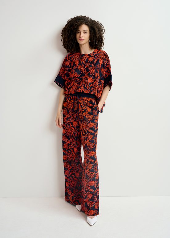 Navy blue wide-leg pants with floral embroideries