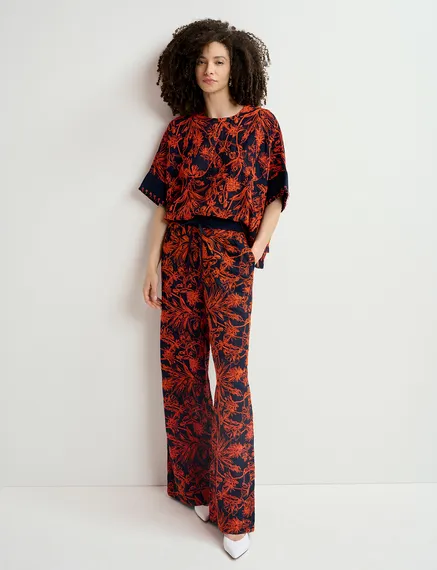 Navy blue wide-leg pants with floral embroideries