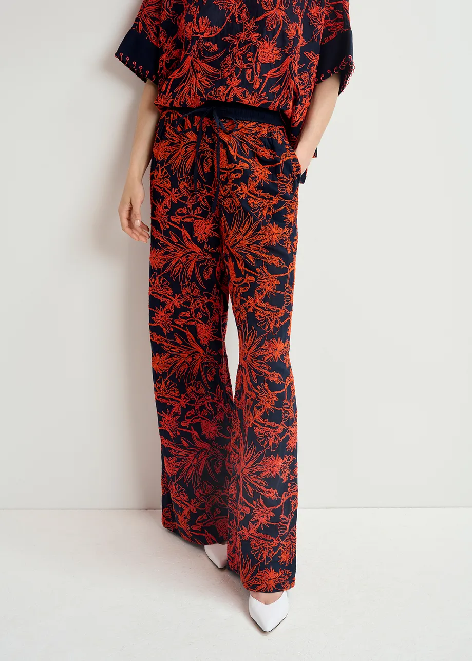 Navy blue wide-leg pants with floral embroideries