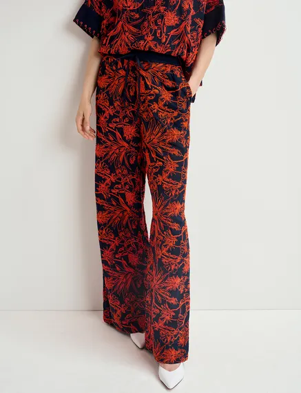 Navy blue wide-leg pants with floral embroideries