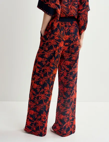 Navy blue wide-leg pants with floral embroideries