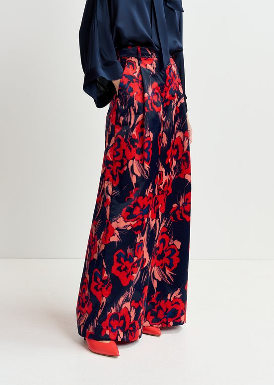 Navy blue satin wide-leg pants with floral print