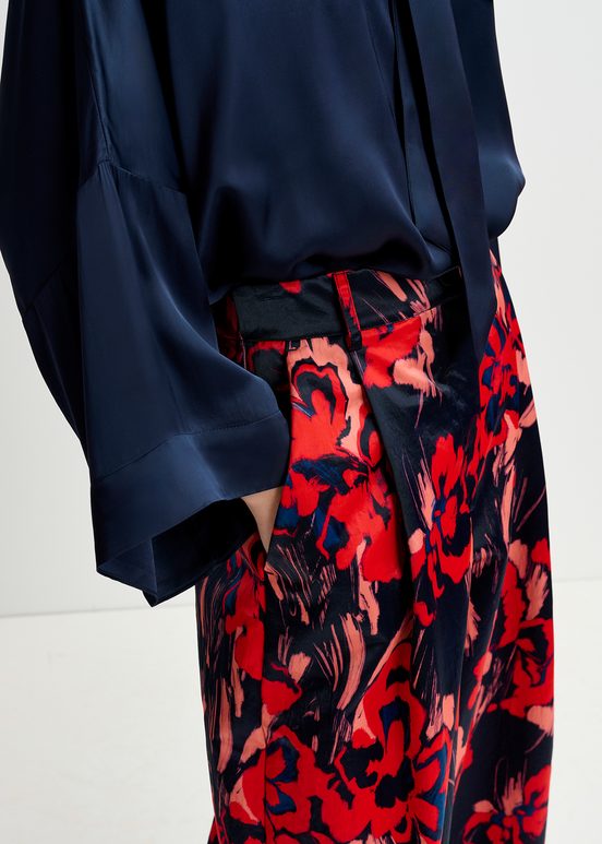 Navy blue satin wide-leg pants with floral print