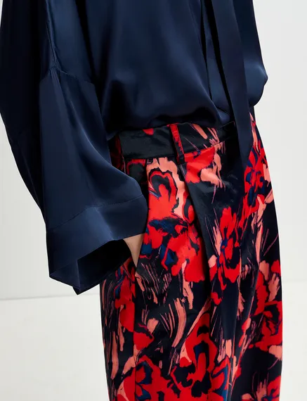 Navy blue satin wide-leg pants with floral print