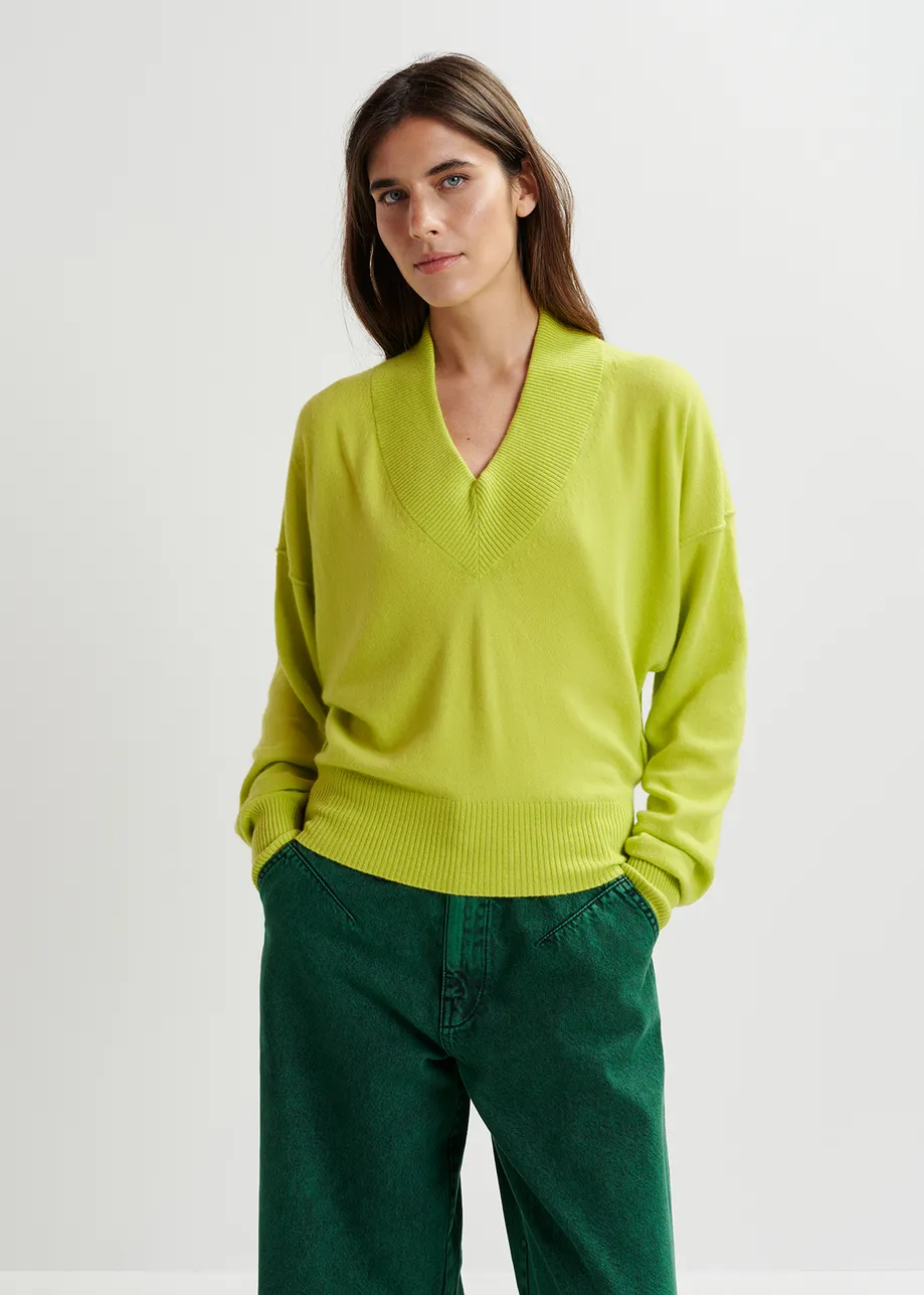 Lime green V-neck knit sweater