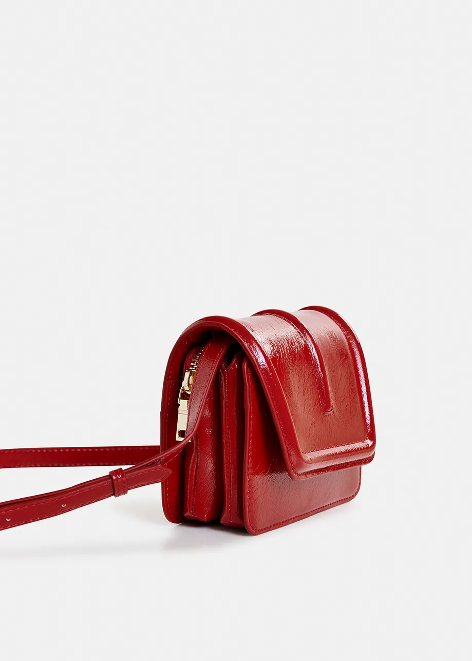 Sac à bandoulière en faux cuir verni rouge foncé