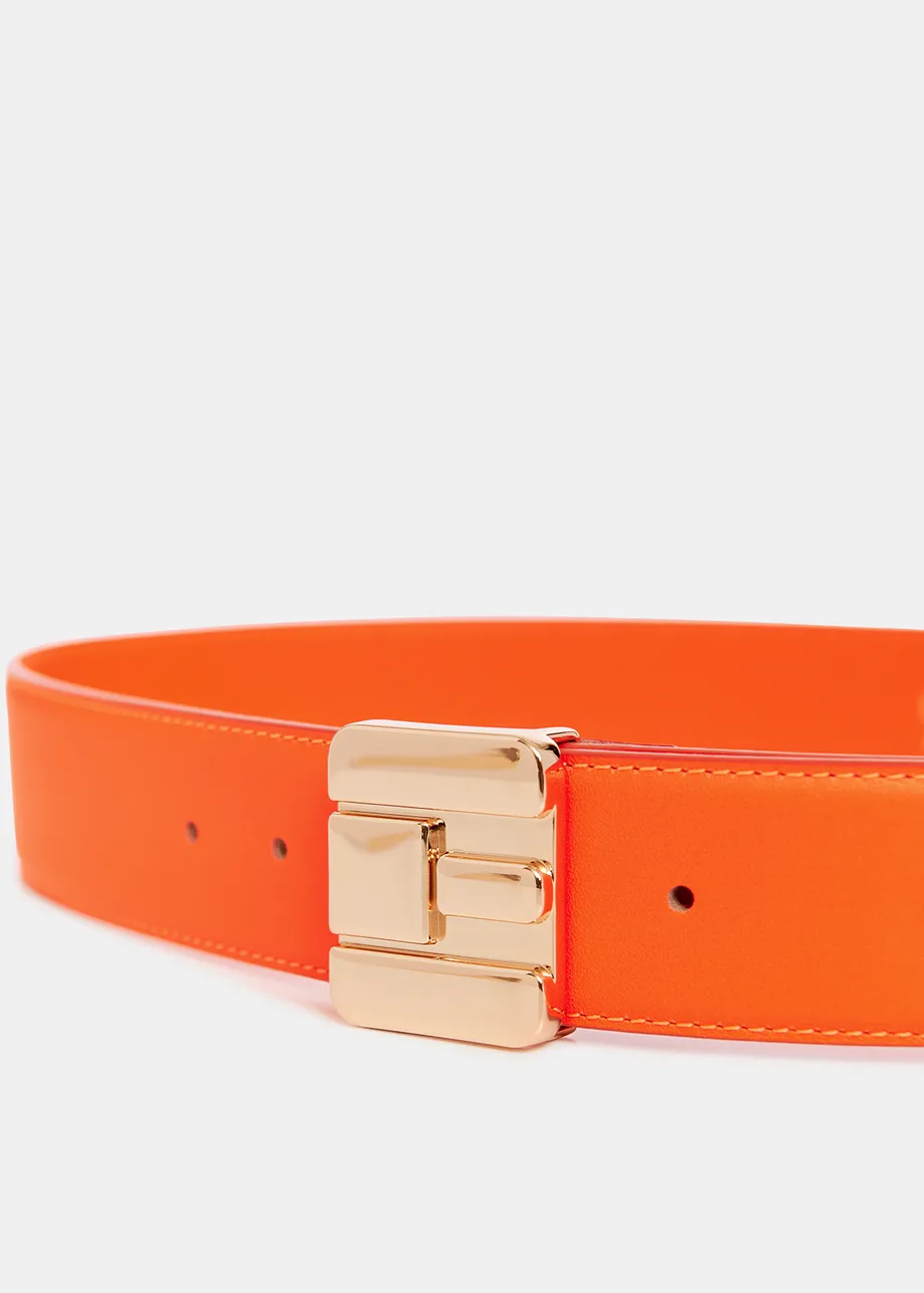 Orange leather belt with E-shaped buckle