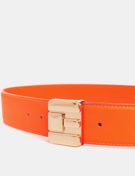 Orange leather belt with E-shaped buckle