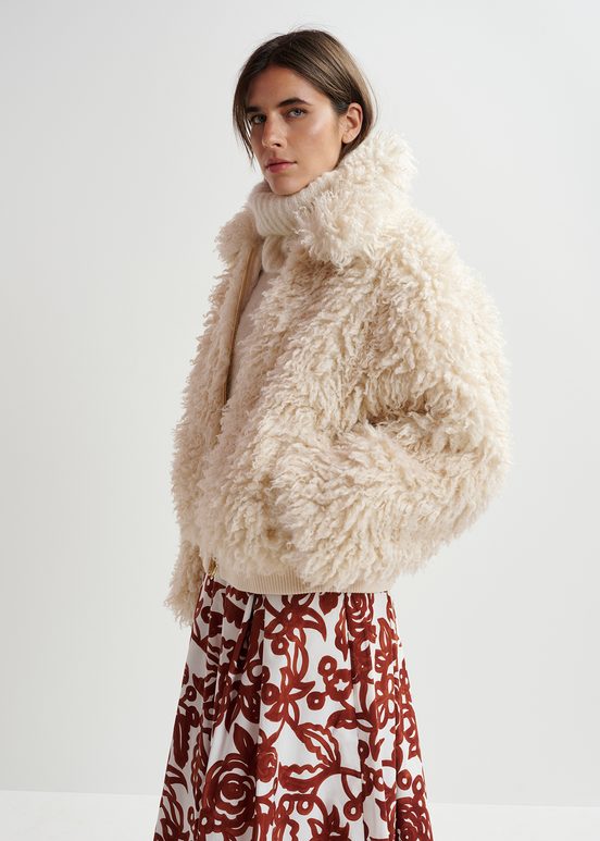 Giacca in shearling sintetico écru