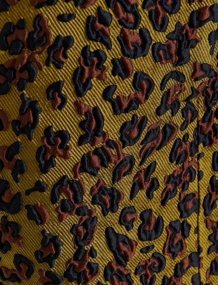 Mini-jupe en jacquard léopard kaki, brune et noire