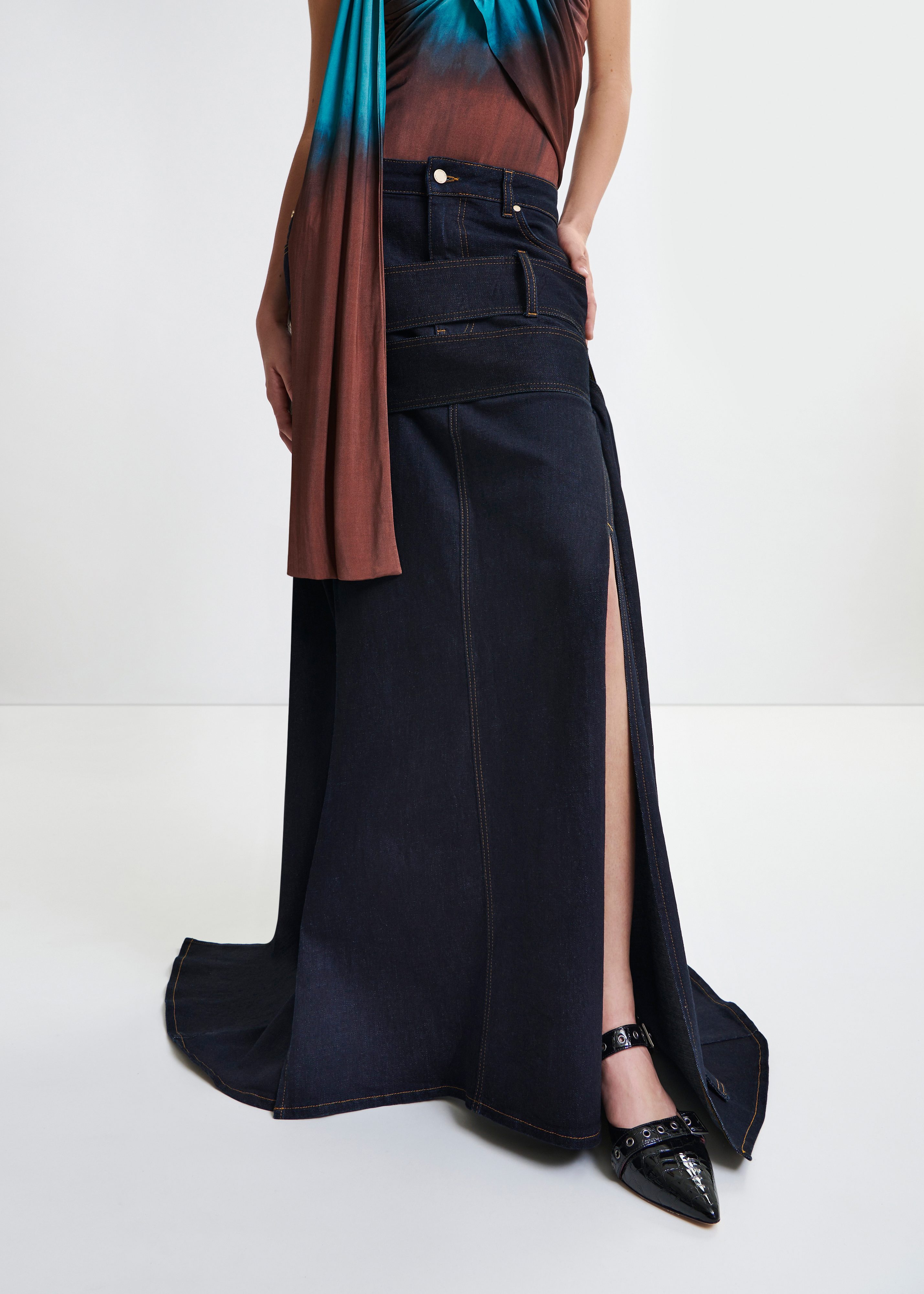 Dark blue asymmetrical midi skirt with buckle fastening