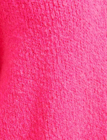 Pull en gros tricot rose fluo