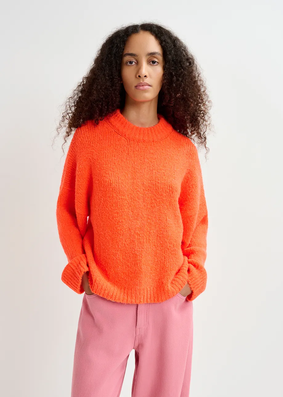 Neonorangener Grobstrickpullover