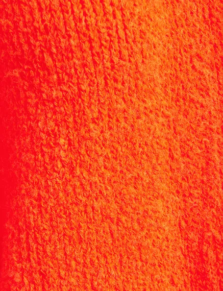 Pull en gros tricot orange fluo