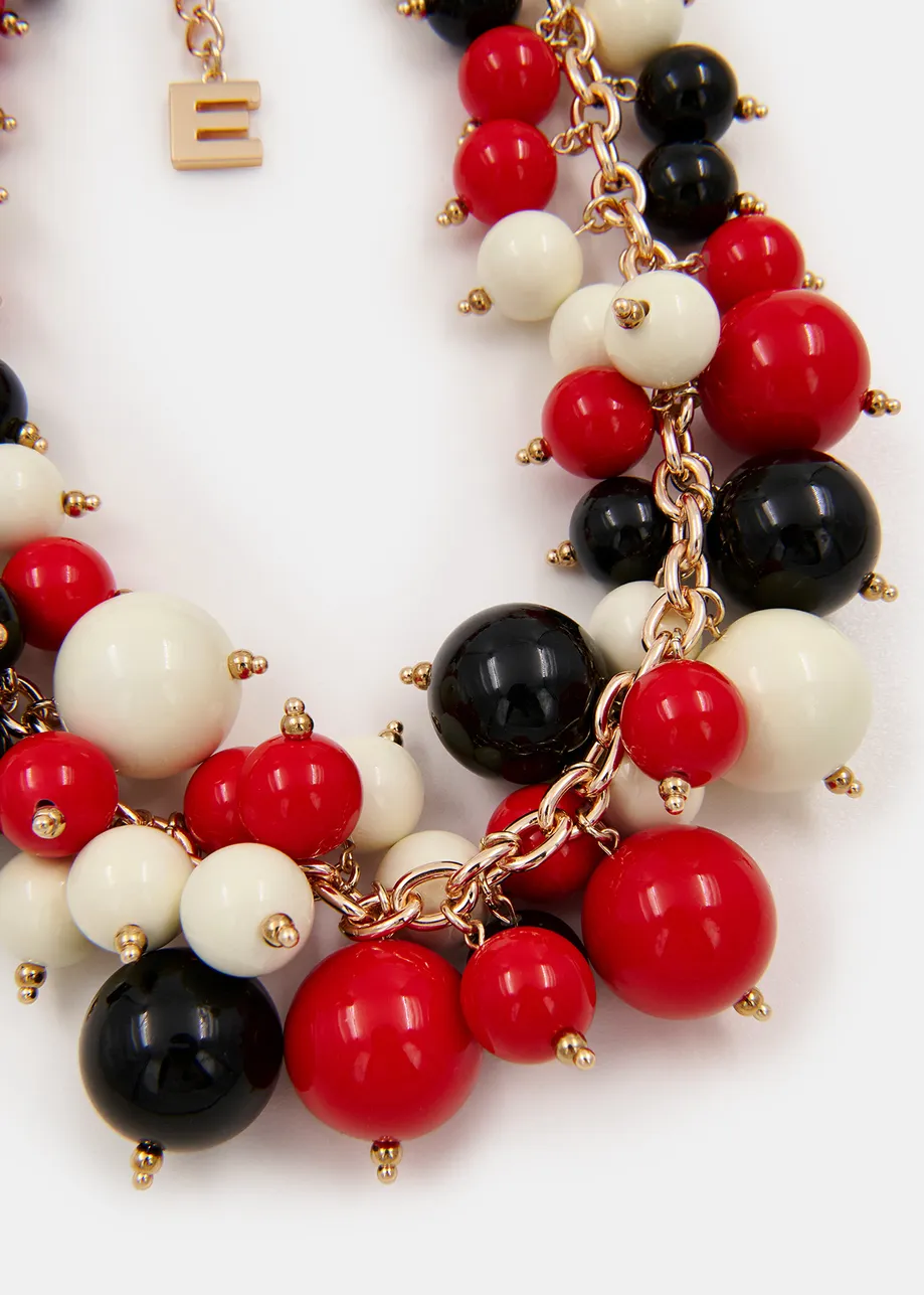 Red, off-white and black sphere-strung chain necklace