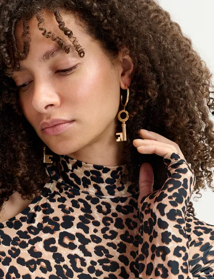 Gold-tone hoop earrings with key pendants