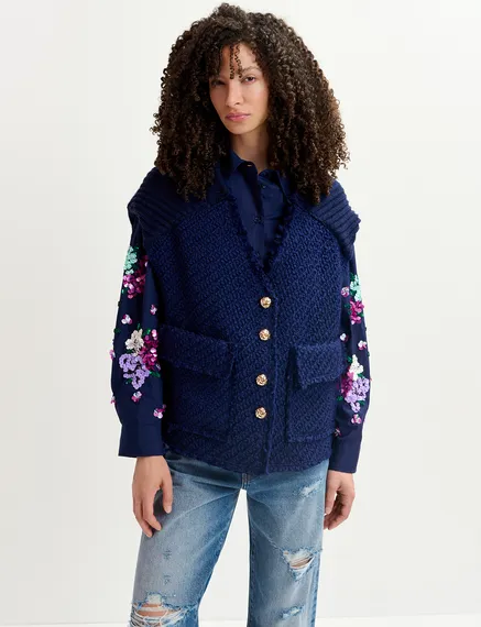 Navy blue sleeveless knitted jacket